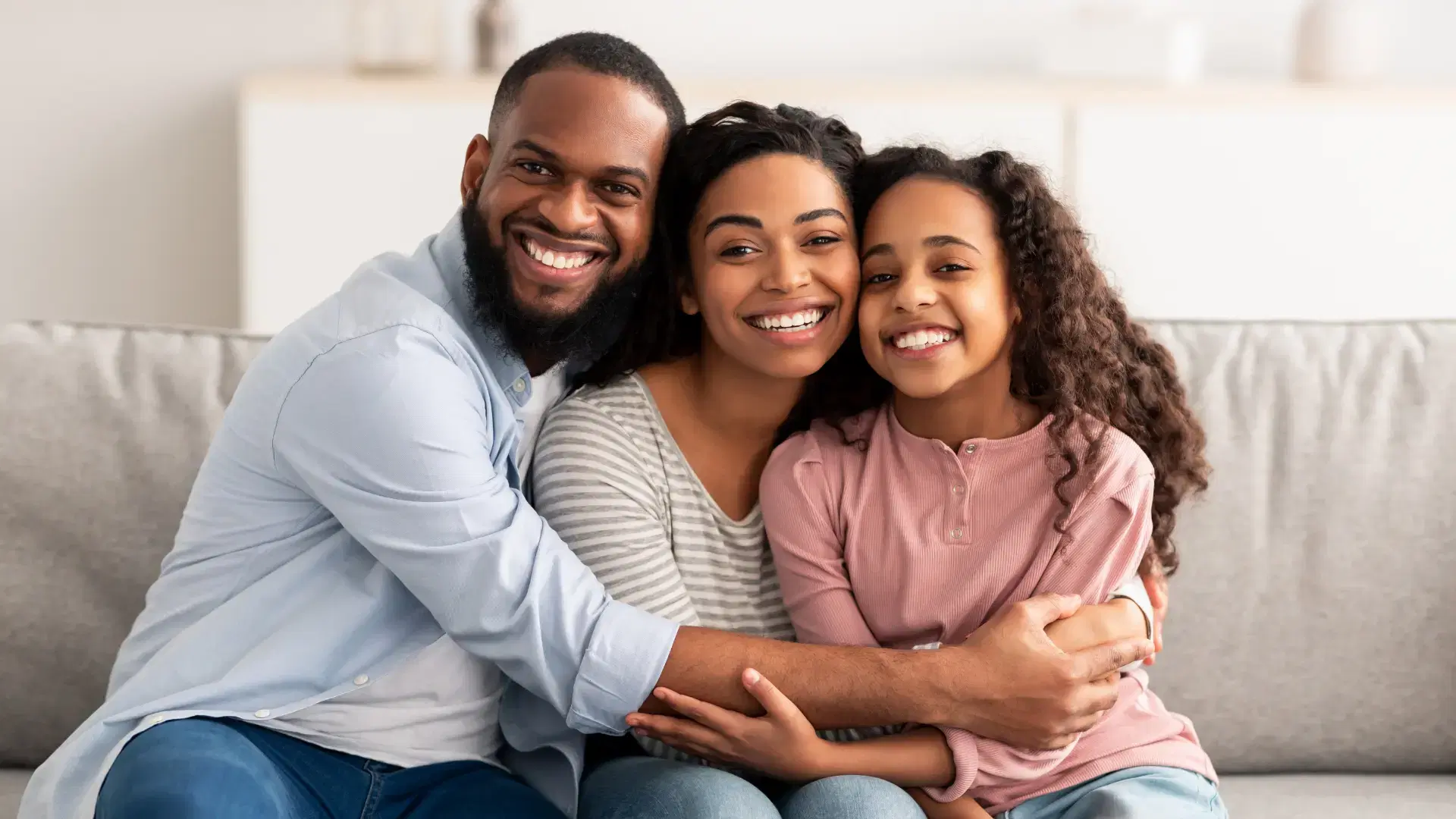 Happy couple expecting a baby, representing the care and support Cryolink provides for fertility journeys